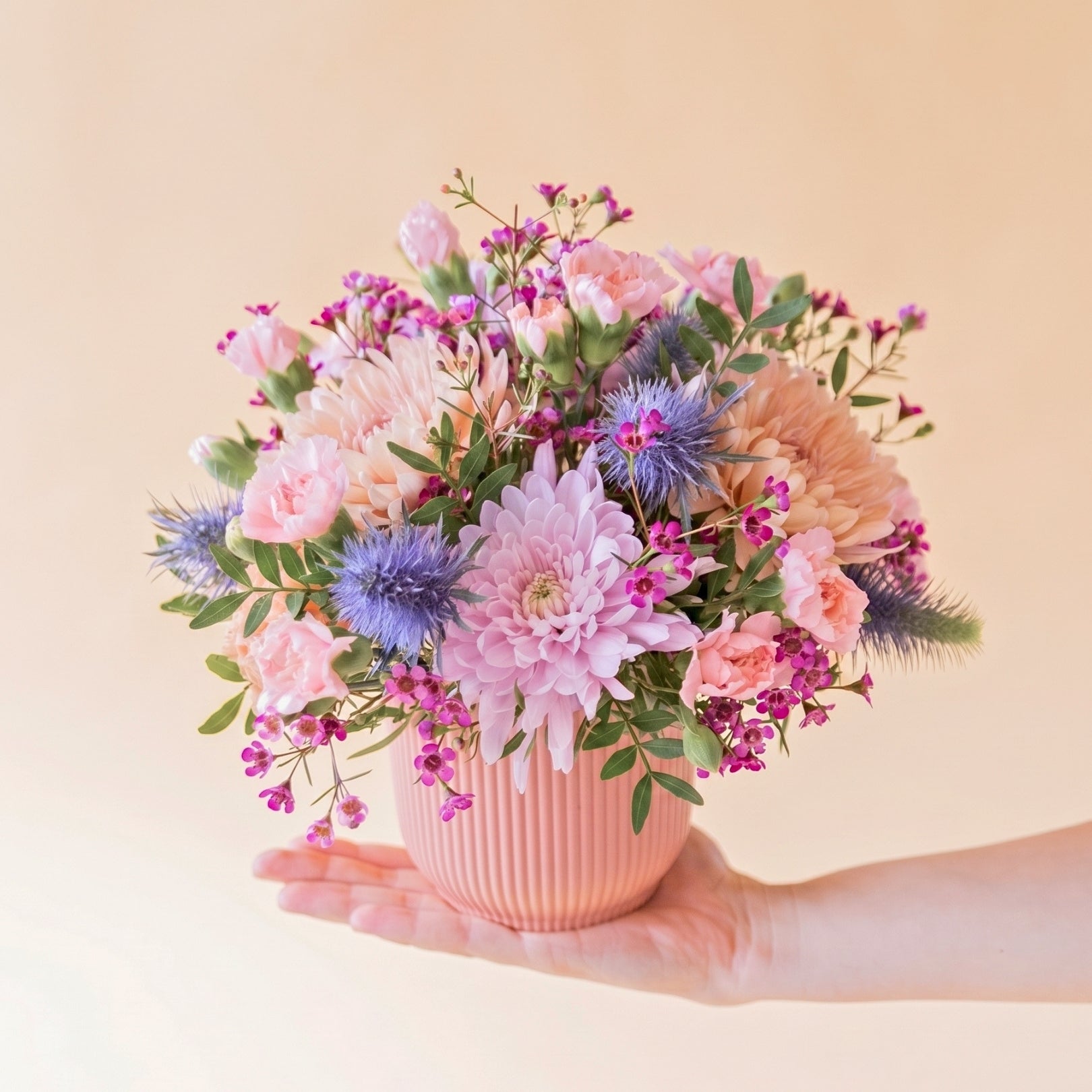 The Wink – Purple and Blue Flower Arrangement